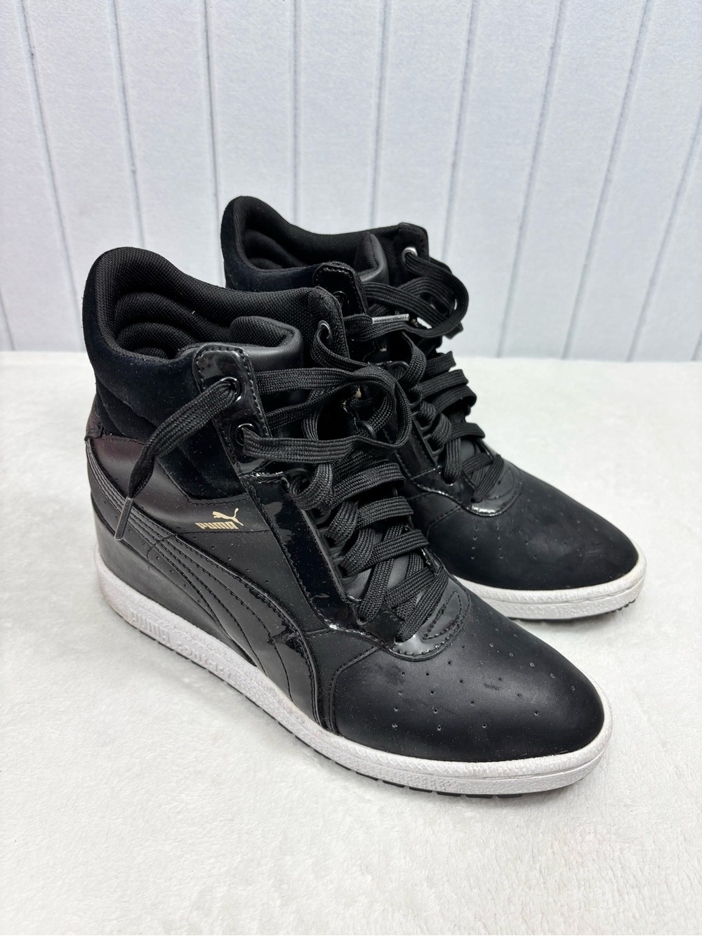 Puma Advantage Wedge Black High-Top Sneakers with White Sole and Gold Logo